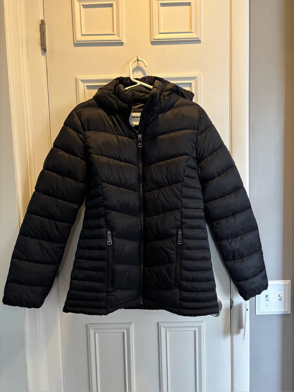 DKNY Black Quilted Woman’s Puffer Jacket with Hood. New with tags.